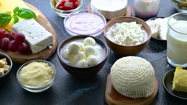 A variety of dairy products including cheese, milk and yogurt.