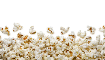 Popcorn scattered on a white background. Isolated