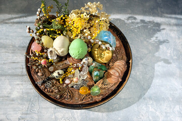 Wiccan altar for Ostara sabbat. witchcraft, magic ritual. wheel of the year, decorative eggs,...