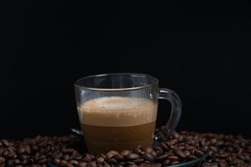 Espresso coffee with foam in glass mug