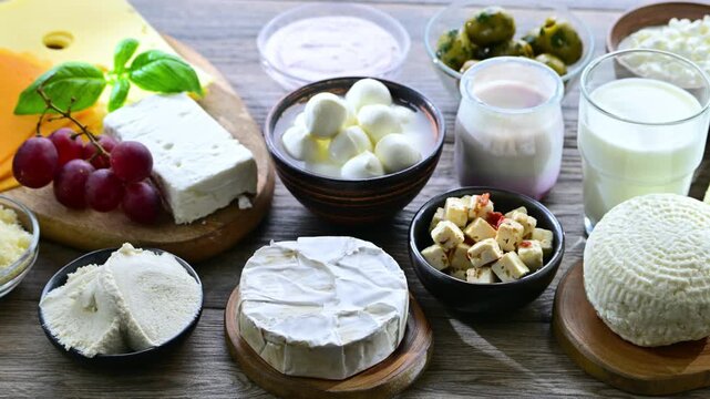A variety of dairy products including cheese, milk and yogurt.
