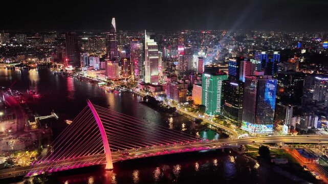 Aerial view of Ba Son Bridge at night in downtown Ho Chi Minh City, connecting District 1 and Thu Duc district