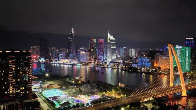 Aerial view of Ba Son Bridge at night in downtown Ho Chi Minh City, connecting District 1 and Thu Duc district