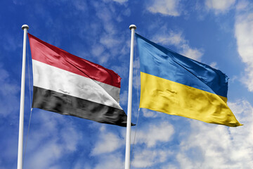 Poignant 3D illustration of the Yemen and Ukraine flags waving side by side against a cloudy sky, representing international solidarity, support, and diplomatic ties between the two nations.