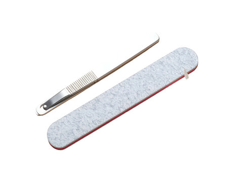 A nail clipper and file against a plain black background