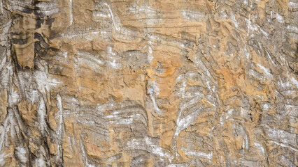 The structure of layered rocks, the geological texture of stone, natural landforms, mountain formation, mineralogy and geology of the landscape. High quality photo