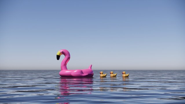 flamingo and duck floatie in the middle of the sea