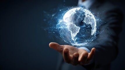 Businessman holding glowing global network in hand.