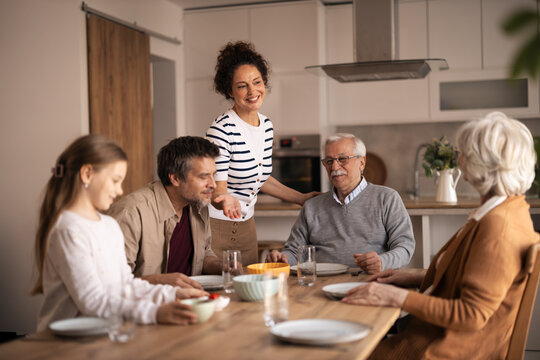Multi-generational family enjoying a pleasant lunch together at home