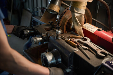 Service tools and car parts on a workbench