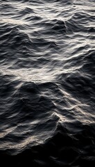 Fototapeta premium Dark Moody Waterscape Texture with Abstract Ripple Effects and Gentle Waves for Creative Backgrounds