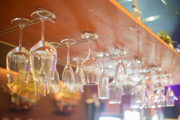 Glass glasses on the bar. Wine Groceries. Clean dishes. Reflection on glass.