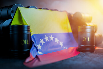 Black barrels of oil or fuel with the Venezuelan flag. Oil production in Venezuela. The price of oil produced in Venezuela. Venezuelan oil. 3D render.