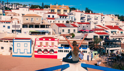 Happy woman enjoying vacation in Portugal, Carvoeiro, Algarve