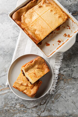 Far Bretonis a traditional cake or dessert a flan style eggs and milk custard with Prunes closeup...