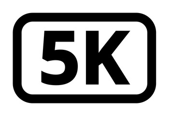 5k marathon signage with bold black and white typography.