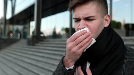 Suffering in the City Young Man Afflicted by the Flu Sneezing and Coughing Persist