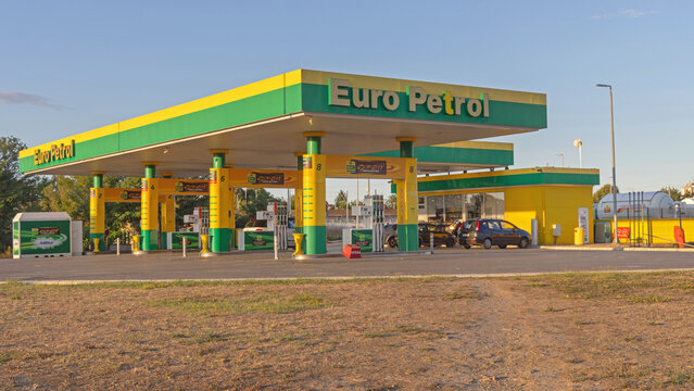 Green and Yellow Euro Petrol Fueling Station Sunny Afternoon