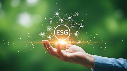 Hand holding glowing ESG environmental social governance network concept