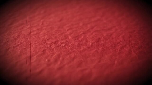 Textured red background with subtle light and shadow