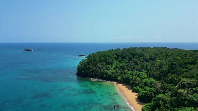 Aerial view of the coast of Pr&iacute;ncipe Island where we can see the magnificent Macaco beach first and Boi beach second, surrounded by the blue sea and lush green forest.Ilha do Principe,Africa
