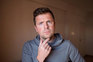 Middle Aged European Man Worried, Thinking About His Problems and Hopeless Situation