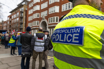 Metropolitan Police Officers on London City Street