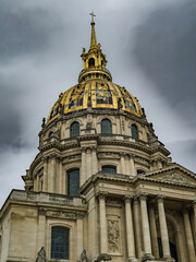 Golden Cupola Of The Invalides Dome - St. Louis Cathedral - With The Tomb Of Napoleon Bonaparte In Paris, France