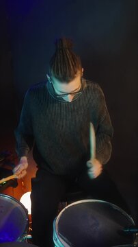 Intense drumhead focus showcasing tight stick skills and mood management