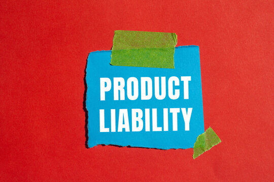 Product liability message written on ripped torn paper background. Conceptual Product liability symbol. Copy space.