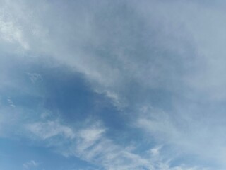 Fototapeta premium Bright Blue Sky with Soft White Clouds and Natural Cloudscape