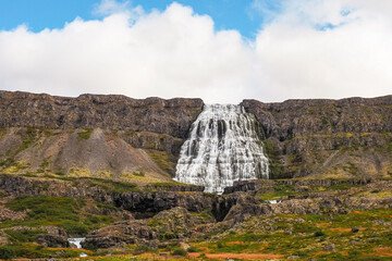 Beautiful Dynjandi waterfall also known as Fjallfoss, close up. Located in Arnarfj&ouml;r&eth;ur in the Westfjords region of Iceland. Top of waterfalls in Dynjandis&aacute; river and has a total height of 100 metres.