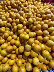 fresh oranges on black background