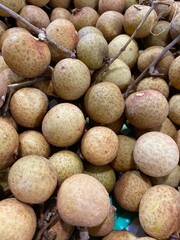 Bunches of Thai longan fruit on the market