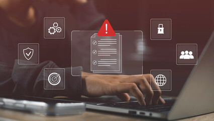 Businessman's hand on laptop with checklist alert icon, representing risk management, strategic control, financial planning, and decision-making in digital business environments.