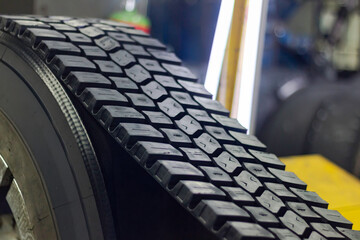 At the tire retreading factory, truck tires with retreaded tread patterns have been given a second life. © Pamir