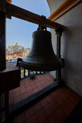 Obraz premium The iconic bells within the belfry of the Convento de Santo Domingo in Lima, a site defined by nearly 500 years of religious and architectural history. 