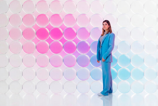 Woman with pastel tones and 3D glass circles background