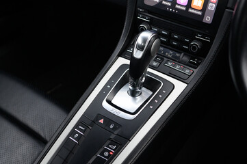 Automatic car gear shifter and transmission control close up