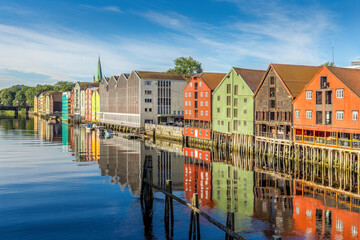 Colorful houses in old downtown of Trondheim, along a river