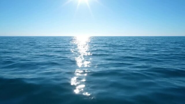 Azure Depths & Surface Play Crystal clear shallow water with sun rays penetrating to the sandy bottom, creating intricate, dancing patterns on the water's surfa