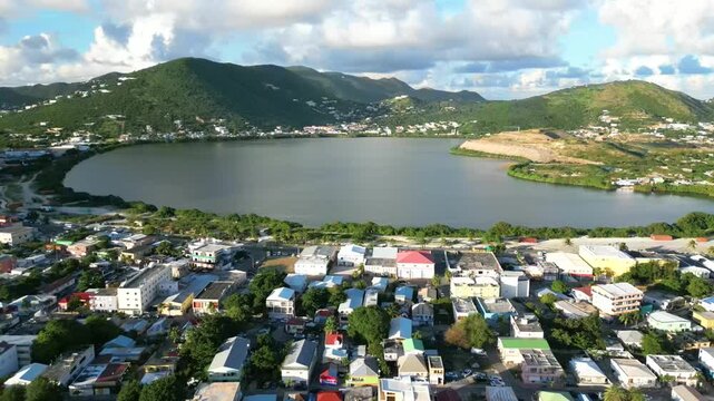 Aerial View Flying Over Houses Toward Simpson Bay Lagoon in Sint Maarten, Caribbean