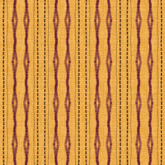 Saffron Seamless Vertical Ikat Stripe Pattern: Traditional Handwoven Tribal Motifs in Mustard Yellow and Maroon on Textured Fabric Background for Ethnic Decor.