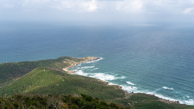Aerial View of a Windy Bay with Rolling Waves