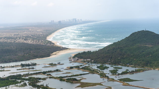 Aerial View of a Windy Bay with Rolling Waves