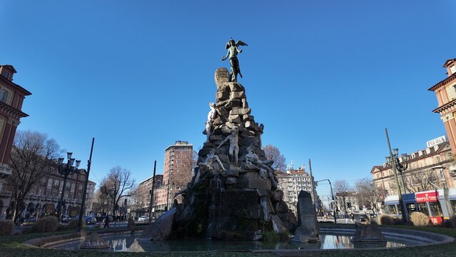 Turin, Italy, January 6, 2026: Monument in Piazza Statuto in Turin dedicated to the Cenisio or Frejus Tunnel, erected to commemorate the tunnel that connected Italy to France