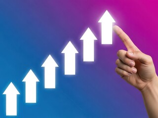 Hand pointing upward with multiple arrows indicating growth and success