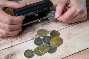 Elderly Hands Counting Coins