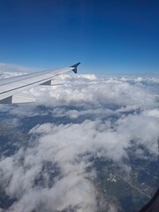 Obraz premium Flying Above Italy – Airplane Window View