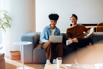 Confident teamwork: Colleagues check progress before next steps